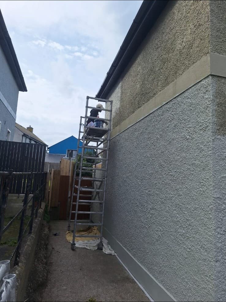 Exterior painting in progress — side wall render