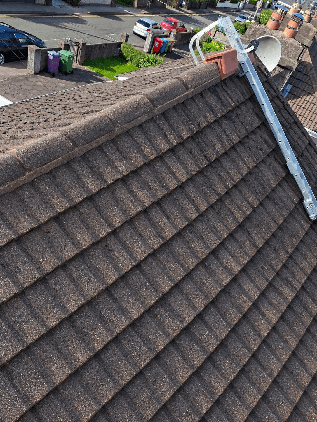 Roof repair completed — tiles restored